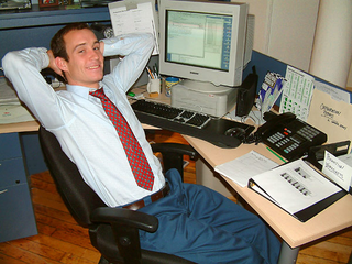 Anderton, who has the world at his feet, works late at the office.